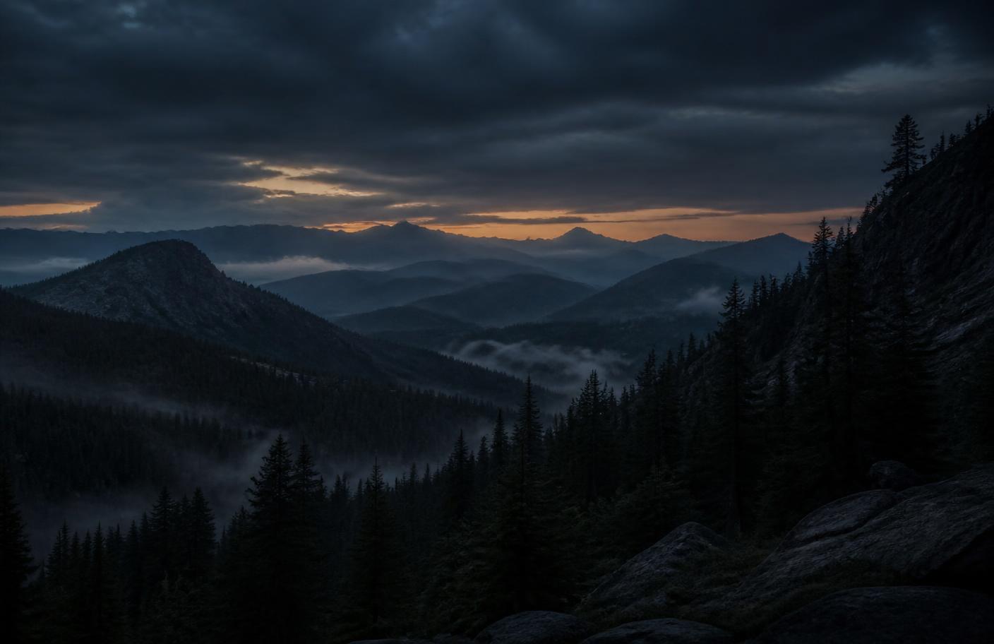 Dark mountain forest landscape at dusk